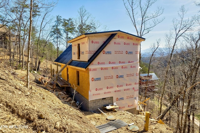 view of home's exterior featuring metal roof