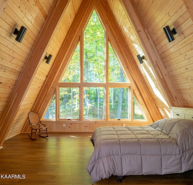 bedroom featuring wooden ceiling, vaulted ceiling with beams, and hardwood / wood-style floors