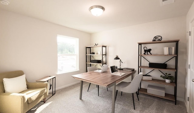 carpeted home office with baseboards and visible vents