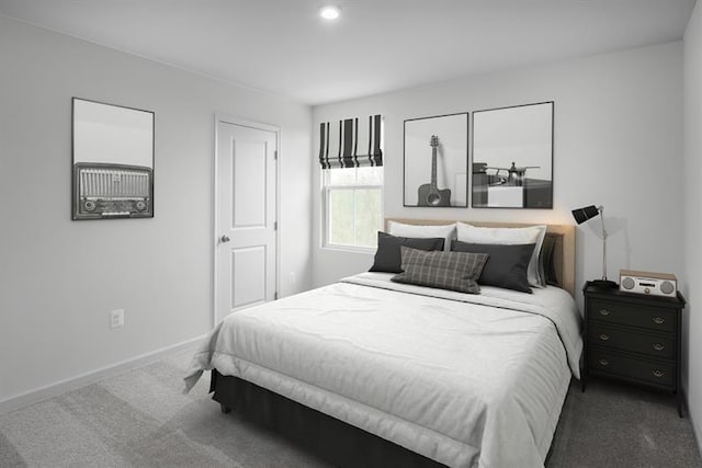 carpeted bedroom featuring baseboards