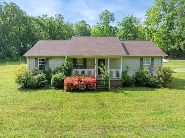 374 Howell Wilkins Rd, Parsons, TN 38363 - ranch-style house with roof with shingles, covered porch, and a front yard