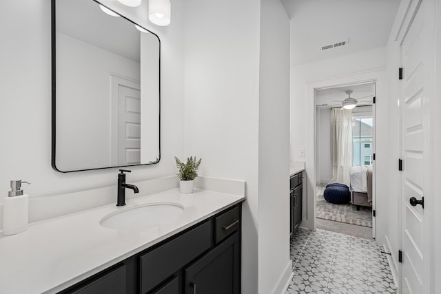 114 Portico Pl, La Vergne, TN 37086 - bathroom with connected bathroom, vanity, tile patterned floors, baseboards, and visible vents
