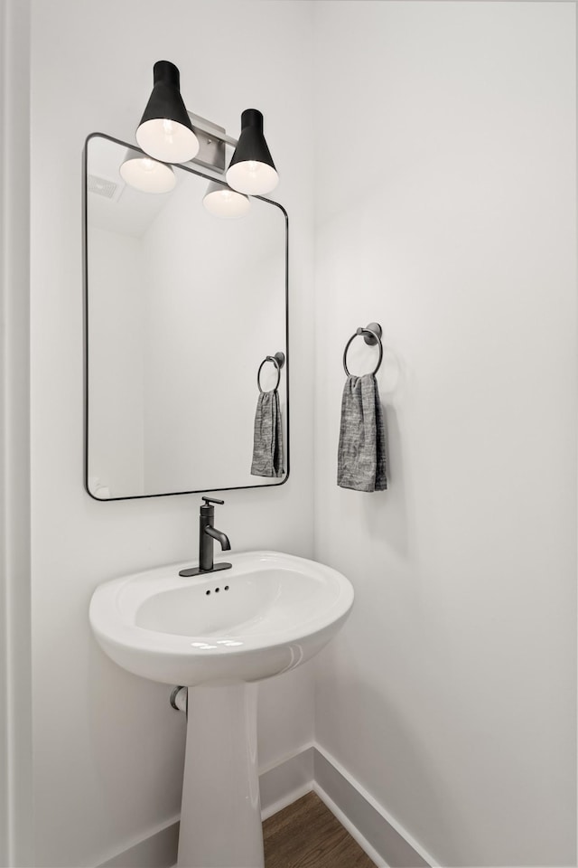 114 Portico Pl, La Vergne, TN 37086 - bathroom with baseboards and wood finished floors