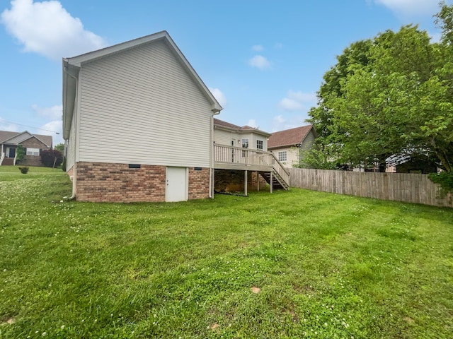 4013 Kristen St, Spring Hill, TN 37174 - back of house with stairs, fence, a yard, and a deck