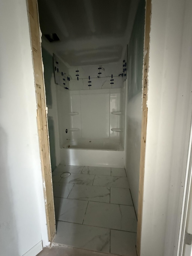 615 Guildfield Dr, Clarksville, TN 37043 - full bathroom with marble look tiles and bathing tub / shower combination