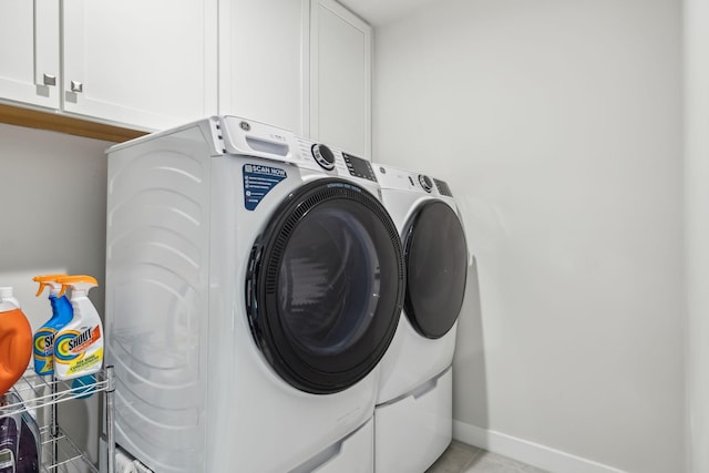 5017 Great Falls Ct, College Grove, TN 37046 - laundry area with washer and dryer, cabinet space, light tile patterned floors, and baseboards