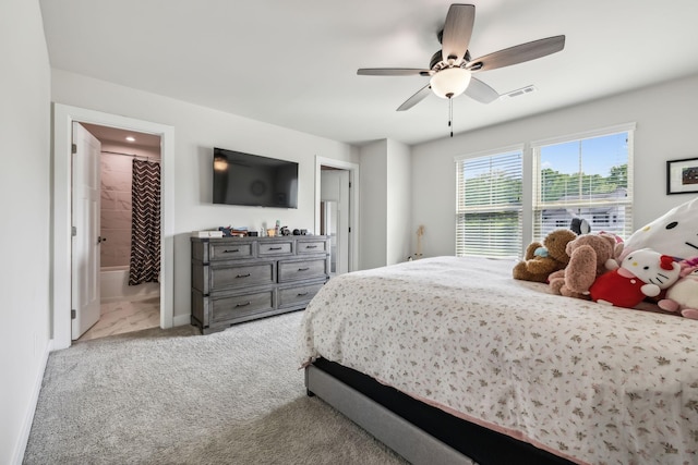 5017 Great Falls Ct, College Grove, TN 37046 - bedroom featuring baseboards, ceiling fan, ensuite bathroom, and light colored carpet