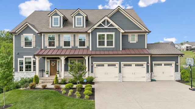 5017 Great Falls Ct, College Grove, TN 37046 - craftsman-style home with stone siding, concrete driveway, board and batten siding, and roof with shingles