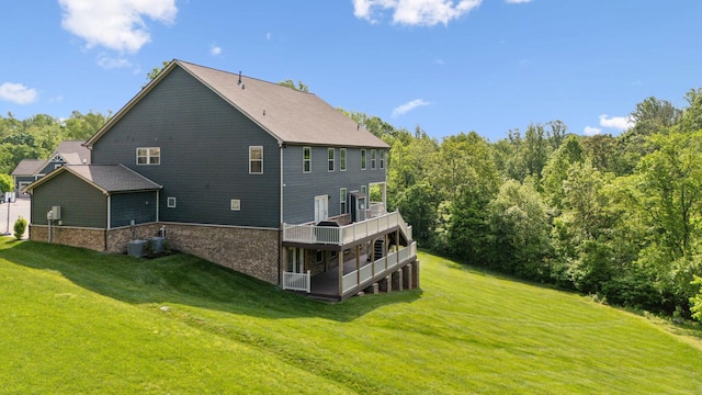 5017 Great Falls Ct, College Grove, TN 37046 - back of property featuring a lawn, a wooden deck, and cooling unit