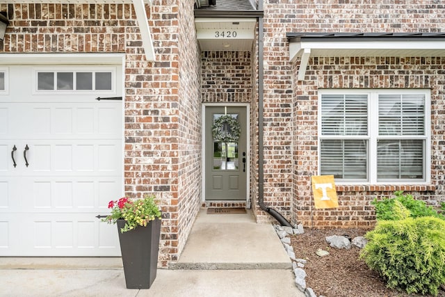 3420 Caroline Farms Dr, Murfreesboro, TN 37129 - doorway to property featuring brick siding and a garage
