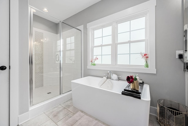 3420 Caroline Farms Dr, Murfreesboro, TN 37129 - full bath with a freestanding tub, a shower stall, recessed lighting, and baseboards