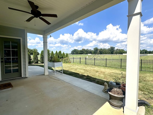 3420 Caroline Farms Dr, Murfreesboro, TN 37129 - fenced backyard with a ceiling fan, a patio area, and a view of rural / pastoral area