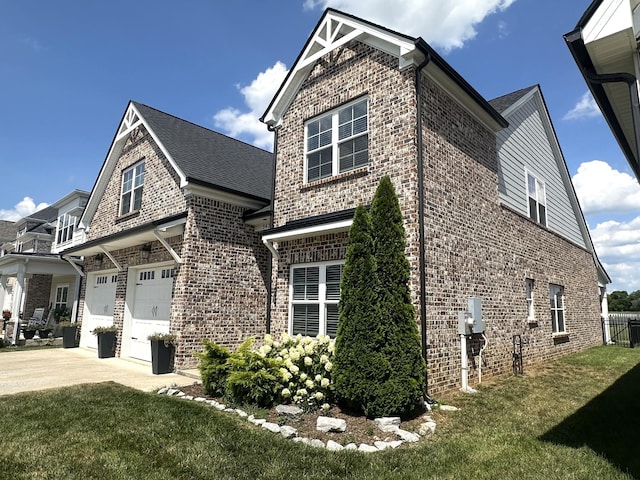 3420 Caroline Farms Dr, Murfreesboro, TN 37129 - view of side of property featuring brick siding, a garage, driveway, and a lawn