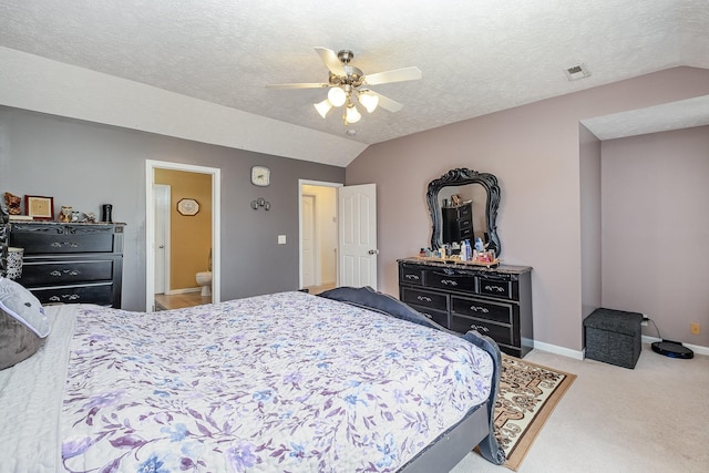 bedroom with ceiling fan, visible vents, carpet floors, baseboards, and lofted ceiling