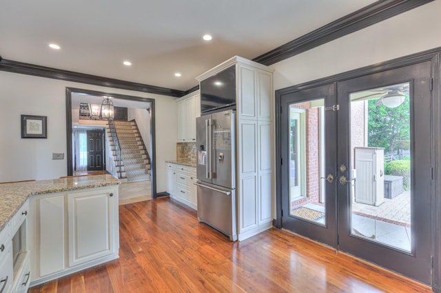 107 Churchill Farms Dr, Murfreesboro, TN 37127 - kitchen featuring crown molding, white cabinetry, french doors, and high end refrigerator