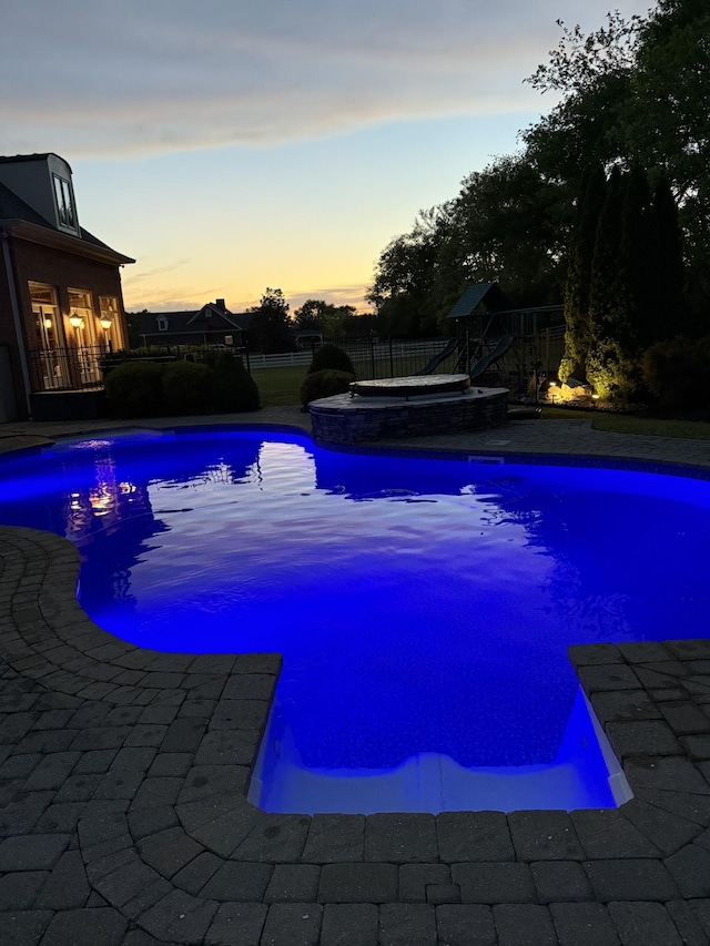 107 Churchill Farms Dr, Murfreesboro, TN 37127 - pool at dusk with a fenced in pool and fence