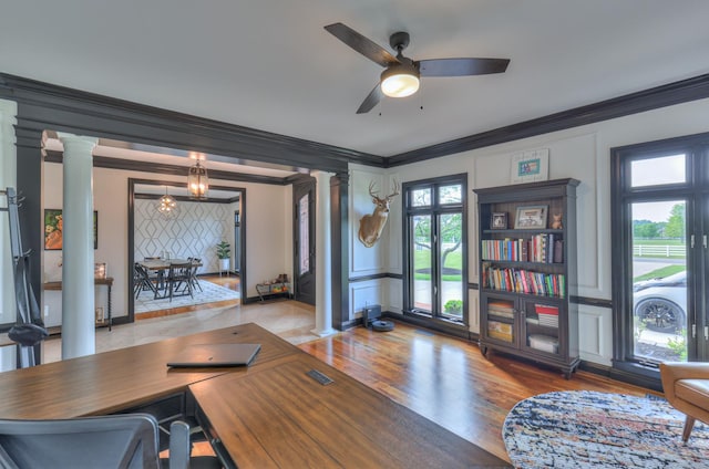 107 Churchill Farms Dr, Murfreesboro, TN 37127 - living room with ornamental molding, wood finished floors, a decorative wall, ceiling fan, and ornate columns