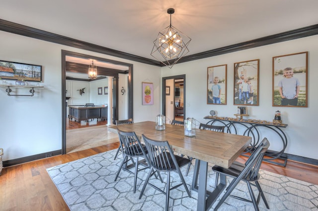 107 Churchill Farms Dr, Murfreesboro, TN 37127 - dining space with baseboards, a chandelier, ornamental molding, and wood finished floors