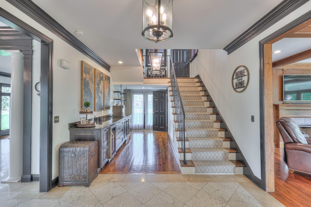 107 Churchill Farms Dr, Murfreesboro, TN 37127 - foyer with baseboards, a chandelier, ornamental molding, and stairway