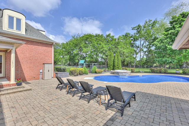 107 Churchill Farms Dr, Murfreesboro, TN 37127 - view of swimming pool featuring a fenced backyard, a patio area, a pool with connected hot tub, and a playground