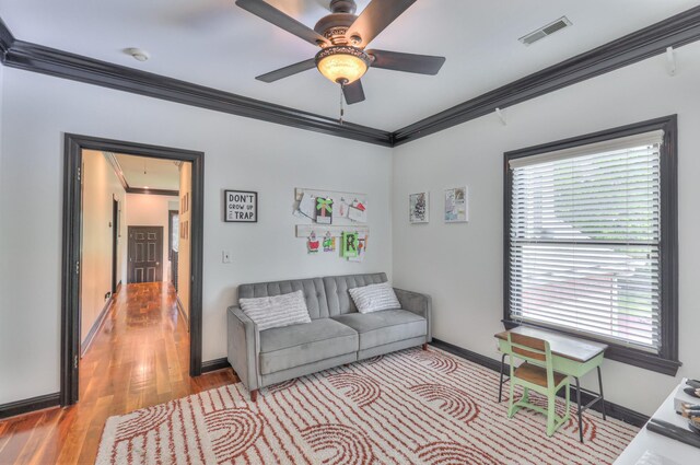 107 Churchill Farms Dr, Murfreesboro, TN 37127 - living area featuring crown molding, ceiling fan, visible vents, and wood finished floors