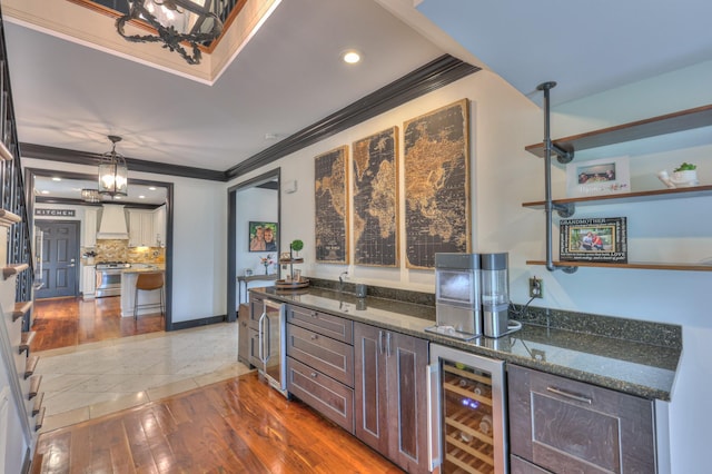 107 Churchill Farms Dr, Murfreesboro, TN 37127 - bar with crown molding, beverage cooler, and a chandelier