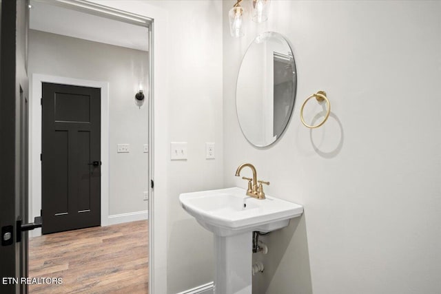 1983 Kaylee Dr, Jefferson City, TN 37760 - bathroom with baseboards and wood finished floors