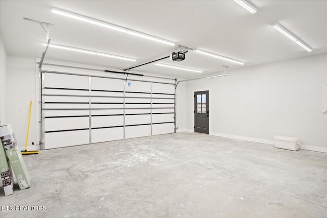 1983 Kaylee Dr, Jefferson City, TN 37760 - garage featuring baseboards and a garage door opener