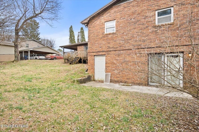 716 Lakewood Dr, Jefferson City, TN 37760 - rear view of property with a lawn and brick siding