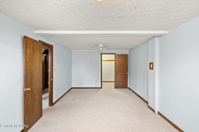 716 Lakewood Dr, Jefferson City, TN 37760 - empty room featuring baseboards, a textured ceiling, and light colored carpet