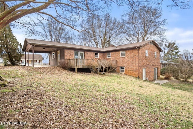 716 Lakewood Dr, Jefferson City, TN 37760 - back of house with brick siding, a wooden deck, a yard, and a chimney