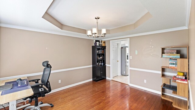 7424 Castlegate Blvd, Knoxville, TN 37918 - office space featuring crown molding, wood finished floors, a raised ceiling, baseboards, and a chandelier