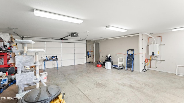 7424 Castlegate Blvd, Knoxville, TN 37918 - garage with tankless water heater and a garage door opener
