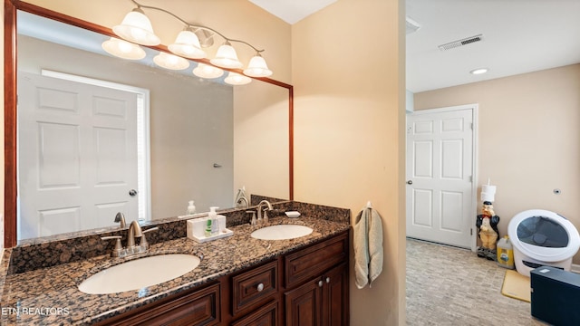 7424 Castlegate Blvd, Knoxville, TN 37918 - bathroom featuring visible vents, a sink, double vanity, and recessed lighting