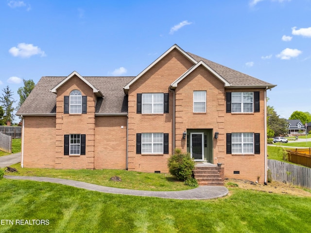7424 Castlegate Blvd, Knoxville, TN 37918 - colonial house featuring fence, a front lawn, and brick siding