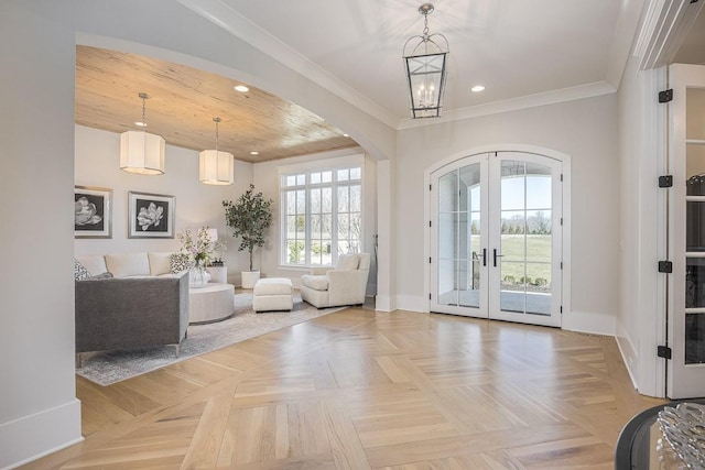 interior space with arched walkways, french doors, recessed lighting, baseboards, and wood ceiling