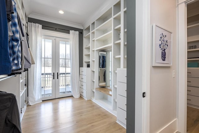 mudroom featuring recessed lighting, ornamental molding, french doors, and light wood-style floors