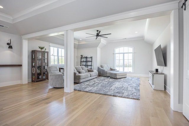living area featuring ceiling fan, visible vents, baseboards, light wood finished floors, and recessed lighting