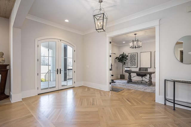 interior space featuring a notable chandelier, french doors, recessed lighting, baseboards, and ornamental molding
