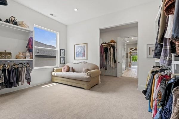 sitting room with carpet and recessed lighting