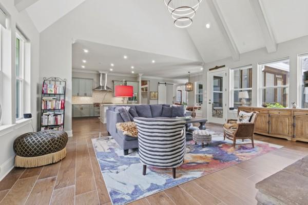 6209 Tall Timbers Rd, Franklin, TN 37067 - living room with beamed ceiling, recessed lighting, high vaulted ceiling, and wood finished floors