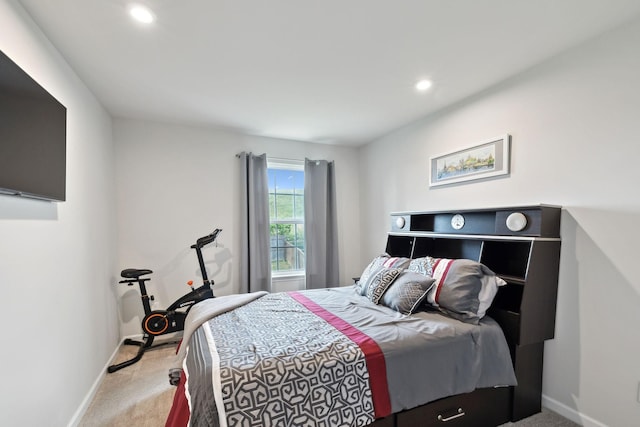 bedroom featuring recessed lighting, baseboards, and carpet