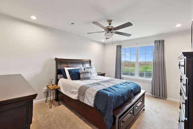 bedroom featuring visible vents, recessed lighting, and light colored carpet
