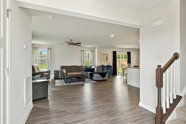 living room featuring recessed lighting, baseboards, a ceiling fan, and wood finished floors