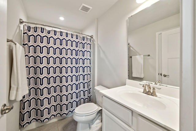 bathroom with tile patterned flooring, vanity, toilet, a shower with shower curtain, and visible vents