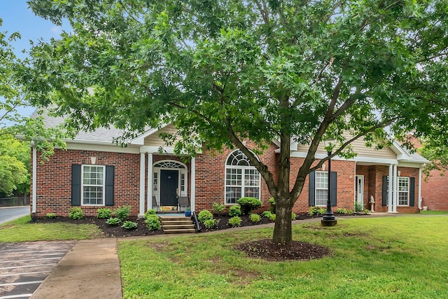 13 Hosier Ct, Lebanon, TN 37087 - view of front of home with a front yard and brick siding