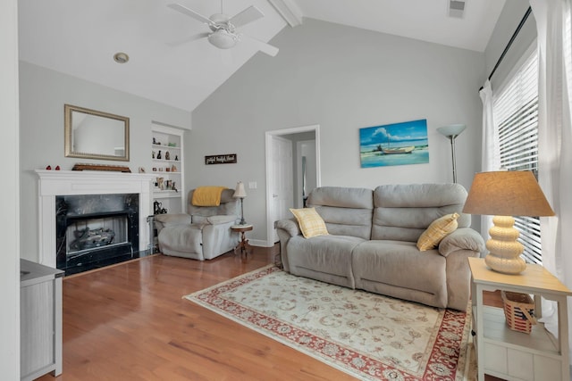 13 Hosier Ct, Lebanon, TN 37087 - living room with ceiling fan, beamed ceiling, wood finished floors, a premium fireplace, and high vaulted ceiling
