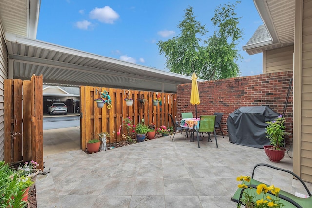 13 Hosier Ct, Lebanon, TN 37087 - view of patio with grilling area, fence, and outdoor dining space