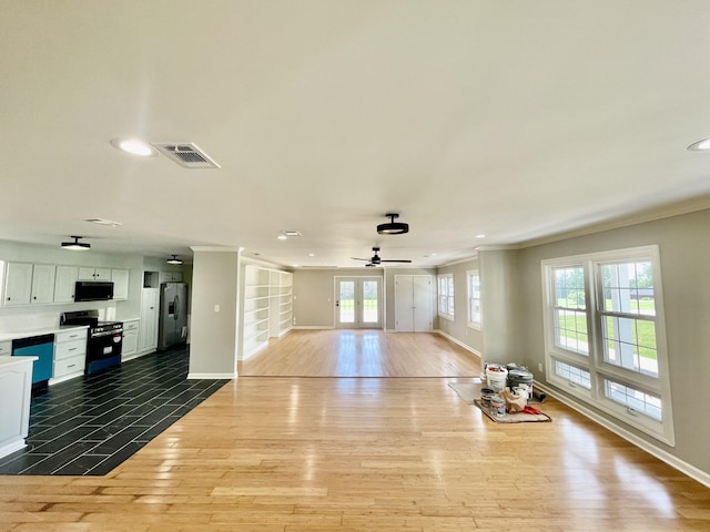 1570 Branch Dr, Lawrenceburg, TN 38464 - unfurnished living room featuring ceiling fan, ornamental molding, recessed lighting, baseboards, and dark wood-style floors