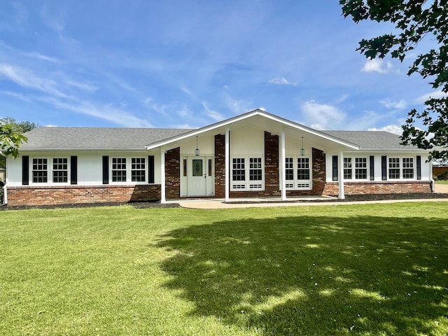 1570 Branch Dr, Lawrenceburg, TN 38464 - ranch-style home featuring brick siding, a front lawn, and roof with shingles